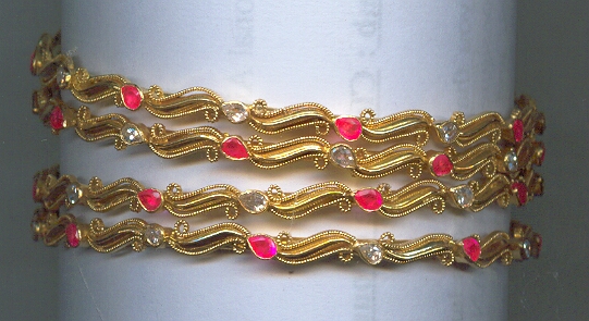 GOLD BANGLE DESIGNER EXCLUSIVE