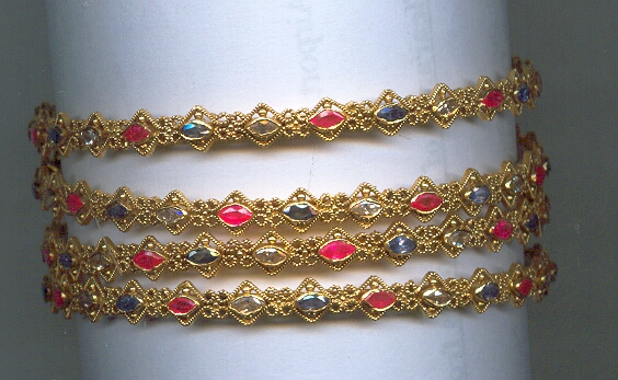 GOLD BANGLE DESIGNER EXCLUSIVE