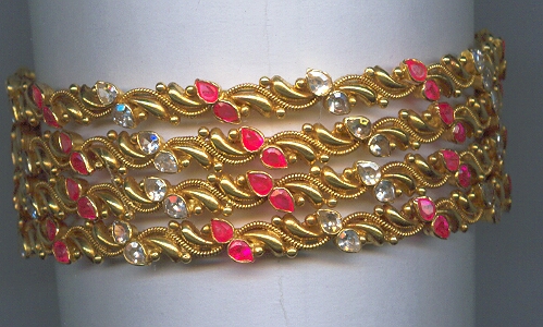 GOLD BANGLE DESIGNER EXCLUSIVE
