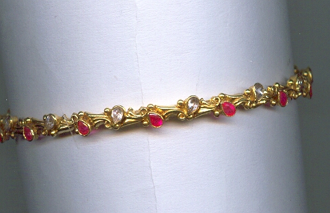 GOLD BANGLE DESIGNER EXCLUSIVE