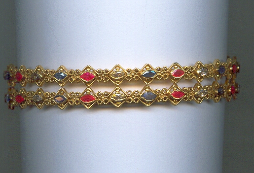 GOLD BANGLE DESIGNER EXCLUSIVE