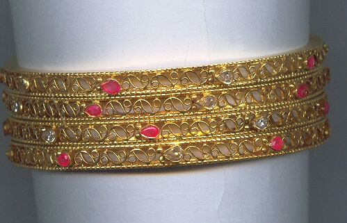GOLD BANGLE DESIGNER EXCLUSIVE