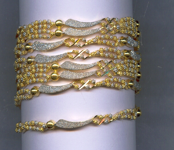 GOLD BANGLE DESIGNER GENERAL