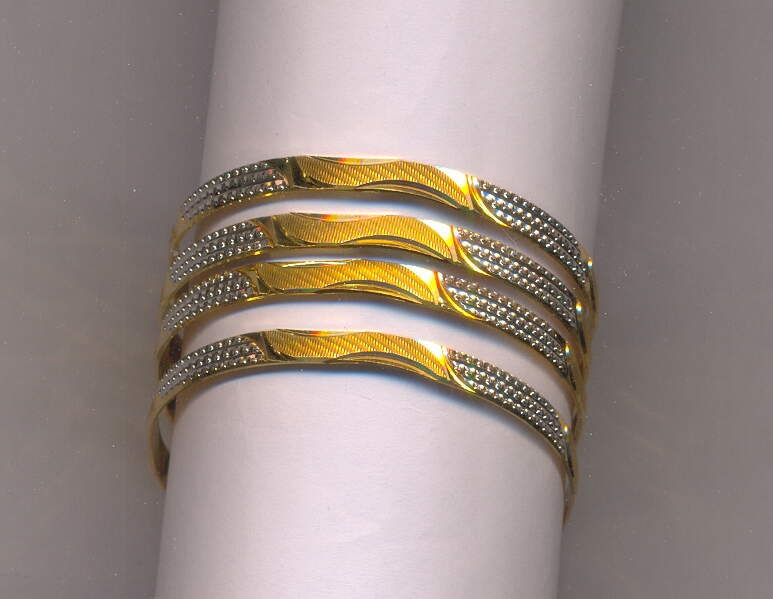 GOLD BANGLE MACHINE CUTTING FANCY
