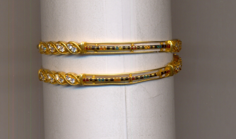 GOLD BANGLE
