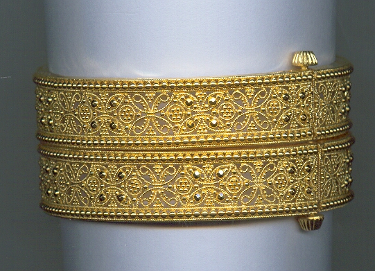 GOLD BANGELS